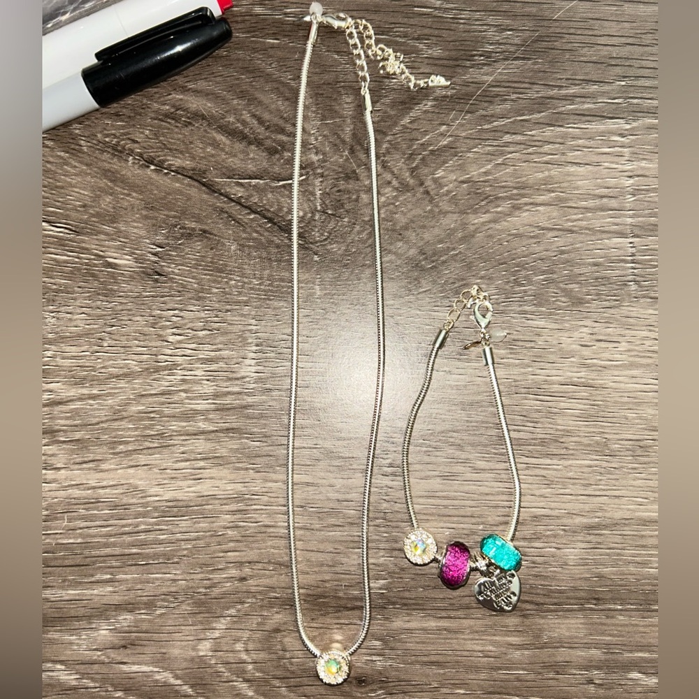 AVON Elegant Silver Necklace and Bracelet Set with Pink and Blue Accents